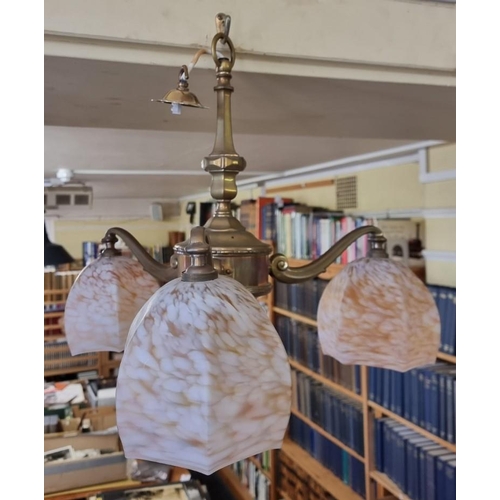 1700 - A brass three branch ceiling light, with marbled glass shades, approx 52.5cm diameter.... 