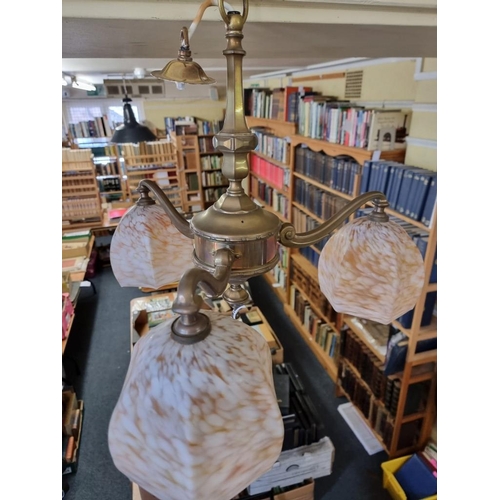 1700 - A brass three branch ceiling light, with marbled glass shades, approx 52.5cm diameter.... 