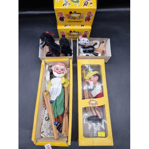 1704 - Four vintage Pelham Puppets, comprising: SL Gepetto (distressed box base only); SL Pinocchio; b... 