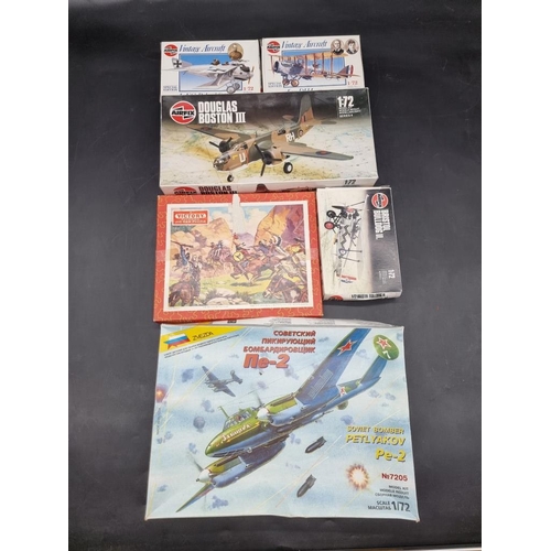 1705 - A small collection of Airfix and other similar aeroplane model kits; together with five vintage jigs... 