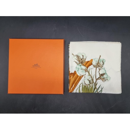 1718 - Hermes: a white ground 'Turbans Des Reines' pattern silk scarf, in original box.