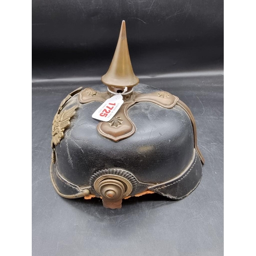 1725 - A German World War I pickelhaube, with Prussian Eagle mount to front, (lacking liner).... 