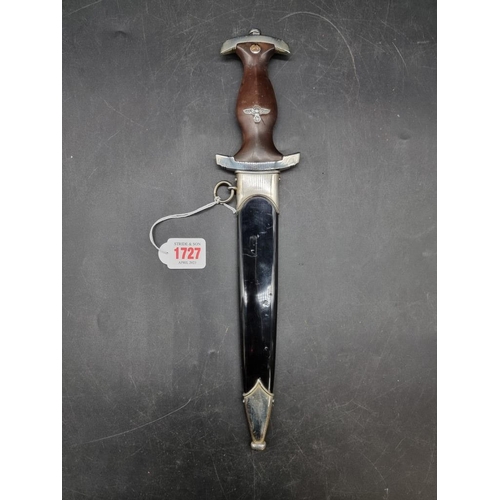 1727 - A German Third Reich NSKK dagger and sheath, the 21.5cm blade stamped 'F Herderas Solingen', the cro... 