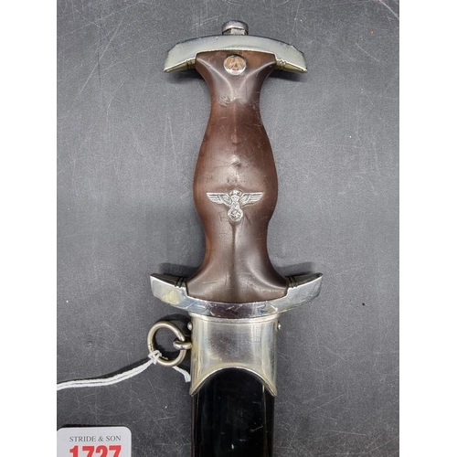 1727 - A German Third Reich NSKK dagger and sheath, the 21.5cm blade stamped 'F Herderas Solingen', the cro... 