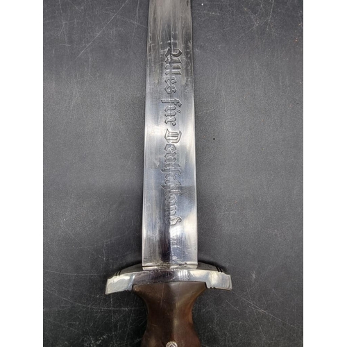 1727 - A German Third Reich NSKK dagger and sheath, the 21.5cm blade stamped 'F Herderas Solingen', the cro... 