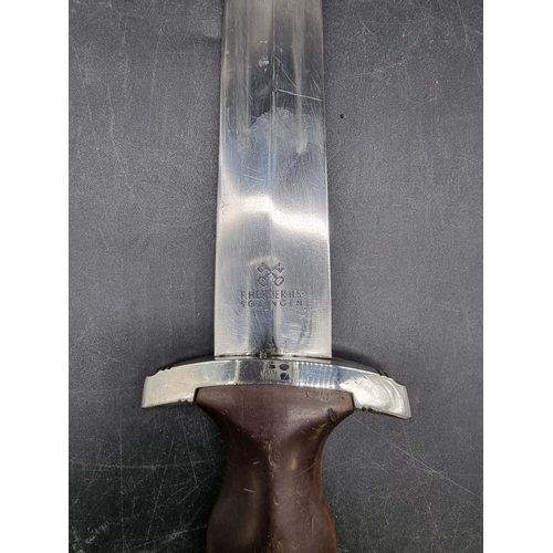 1727 - A German Third Reich NSKK dagger and sheath, the 21.5cm blade stamped 'F Herderas Solingen', the cro... 