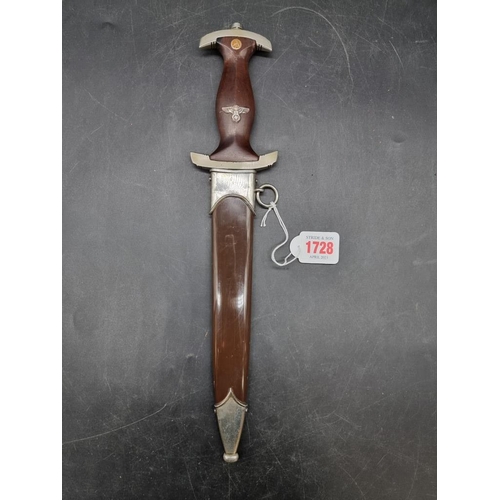 1728 - A German Third Reich SA Model 33 Rohm honour dagger and sheath, with 21cm blade, the crossguard stam... 