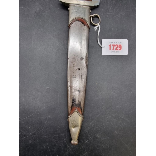 1729 - A German Third Reich SA dagger and sheath, the engraved 22cm blade stamped 'RZM M7/33 1940'.... 