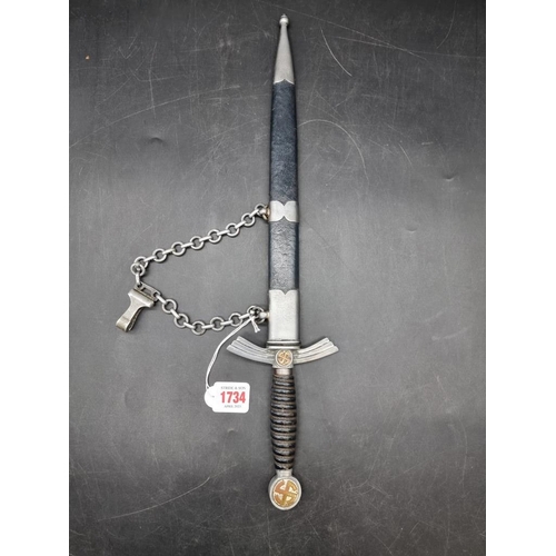 1734 - A German World War II Luftwaffe first pattern officer's dagger and sheath, with 30.5cm blade, by Ern... 