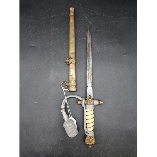 1736 - A German Word War II Kriegsmarine officer's dagger and sheath, second model, by Carl Eickhorn, the R... 