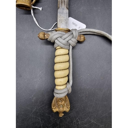 1736 - A German Word War II Kriegsmarine officer's dagger and sheath, second model, by Carl Eickhorn, the R... 