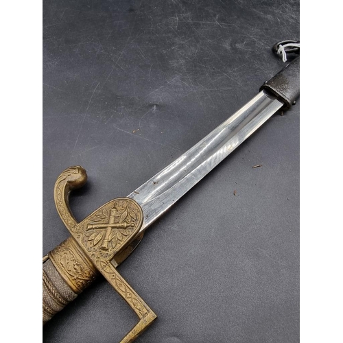 1742 - An Imperial German World War I artillery officer's sword and scabbard, model 1898, with 75.5cm blade... 