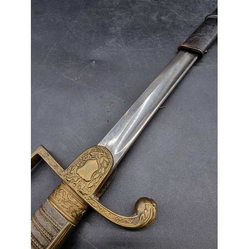 1742 - An Imperial German World War I artillery officer's sword and scabbard, model 1898, with 75.5cm blade... 