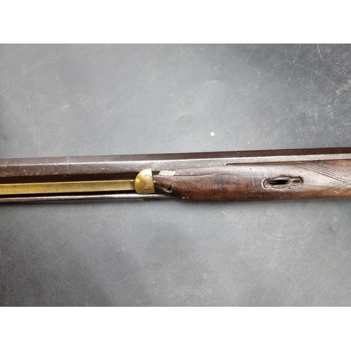 1747 - An antique percussion musket, with 89cm octagonal steel barrel, overall length 130cm.... 