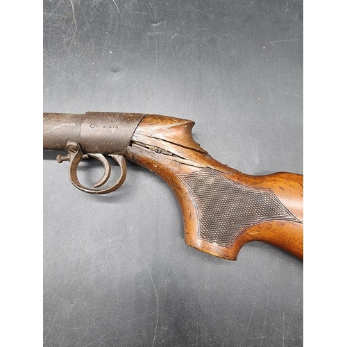 1748 - A vintage BSA standard underlever .177 cal top loading air rifle; together with a canvas shotgun cas... 