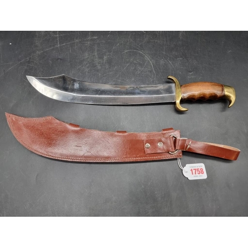 1758 - A large Pakistan Bowie and leather sheath, with 33cm blade.