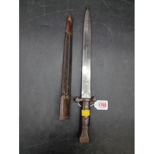 1765 - A Victorian British Army 1888 MkII Lee Metford bayonet and scabbard, by Wilkinson Sword, the 30cm bl... 