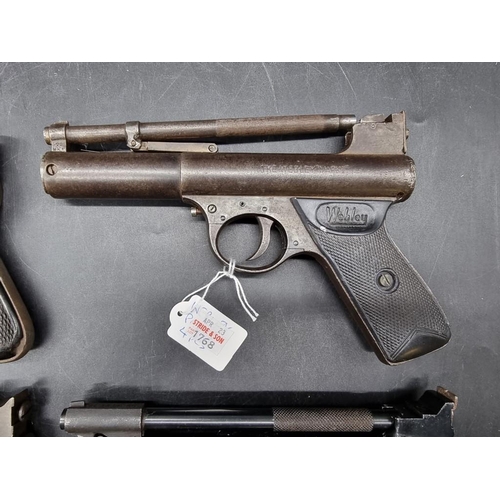 1768 - Four Webley pistols, comprising: a Webley Senior, .22 cal, serial No S16986; a Webley Junior, .... 