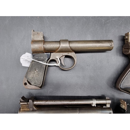 1768 - Four Webley pistols, comprising: a Webley Senior, .22 cal, serial No S16986; a Webley Junior, .... 