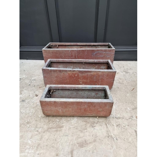 1776 - A graduated set of three copper rectangular planters, largest 76.5cm wide.