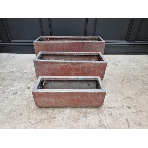 1776 - A graduated set of three copper rectangular planters, largest 76.5cm wide.