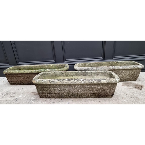 1779 - A set of three composition stone rectangular planters, 68.5cm wide.