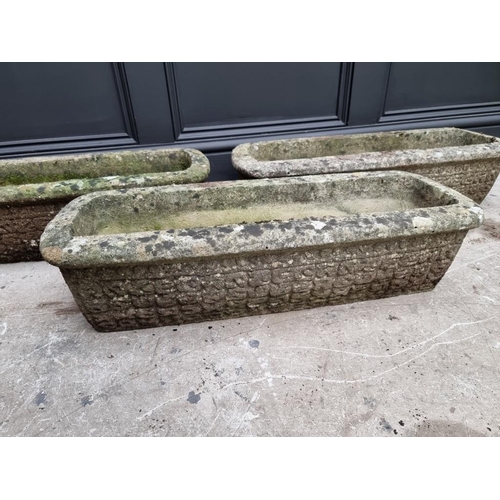 1779 - A set of three composition stone rectangular planters, 68.5cm wide.