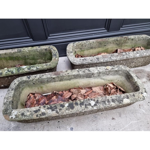 1779 - A set of three composition stone rectangular planters, 68.5cm wide.