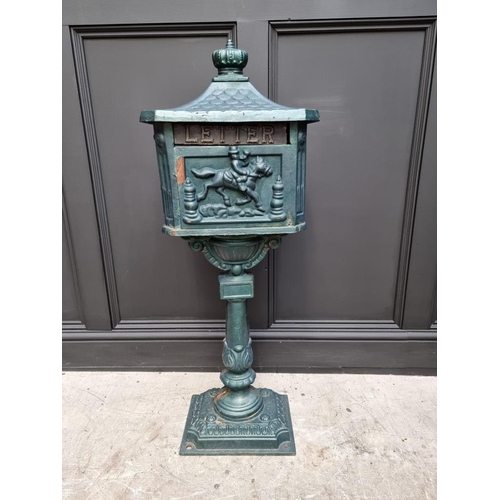 1780 - A green painted cast iron pedestal post box, 107cm high.