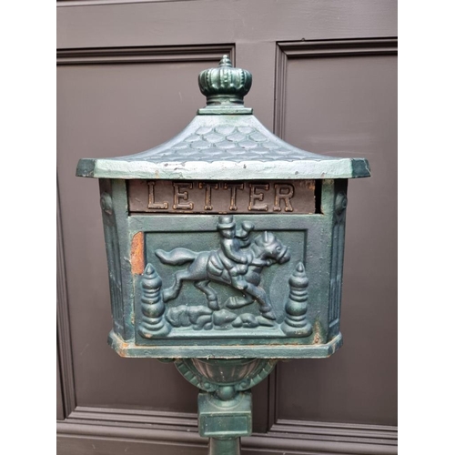 1780 - A green painted cast iron pedestal post box, 107cm high.