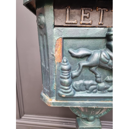 1780 - A green painted cast iron pedestal post box, 107cm high.