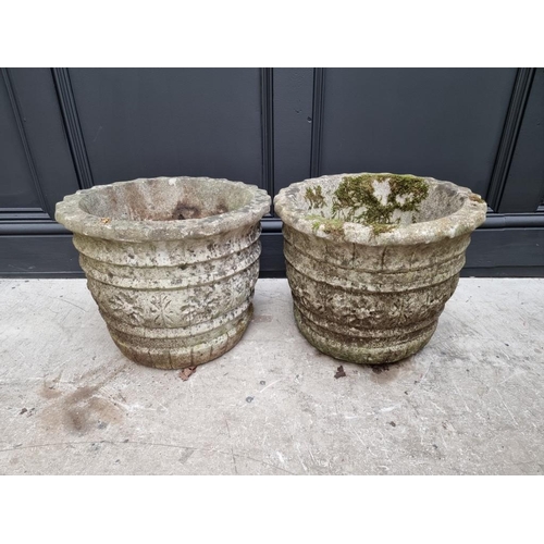 1783 - A pair of composition stone garden planters, 30.5cm high.