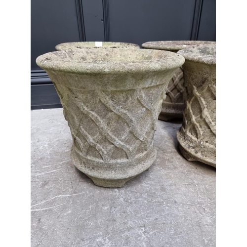 1787 - A set of four composition stone garden planters, 34cm high.