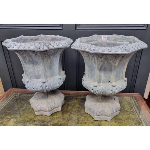 1788 - An unusual pair of composition stone simulated lead octagonal pedestal urns, 50cm high.... 