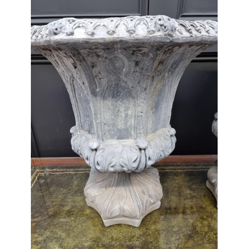 1788 - An unusual pair of composition stone simulated lead octagonal pedestal urns, 50cm high.... 