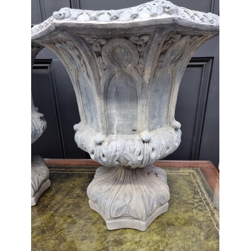 1788 - An unusual pair of composition stone simulated lead octagonal pedestal urns, 50cm high.... 