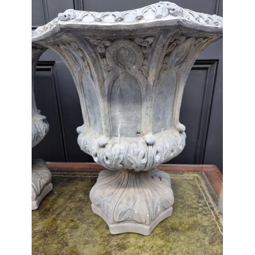 1788 - An unusual pair of composition stone simulated lead octagonal pedestal urns, 50cm high.... 