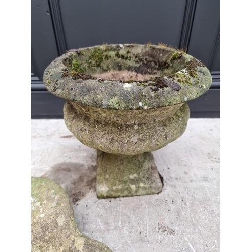 1789 - A composition stone scallop shaped birdbath, 53cm wide; together with a weathered composition stone ... 