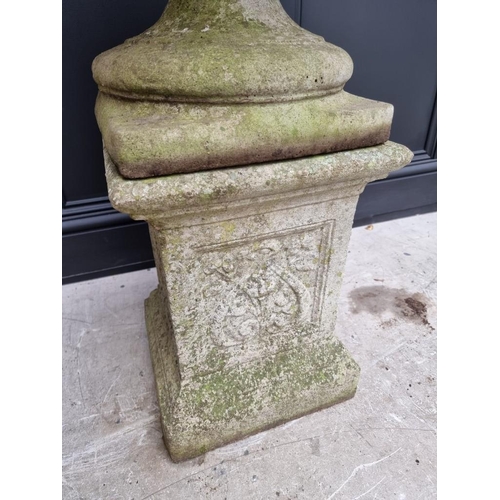 1791 - A large composition stone Campana urn on pedestal, 62cm diameter x 90cm high.