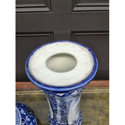 1795 - A Japanese blue and white jardiniere and pedestal, 72cm high, (repairs to jardiniere).... 