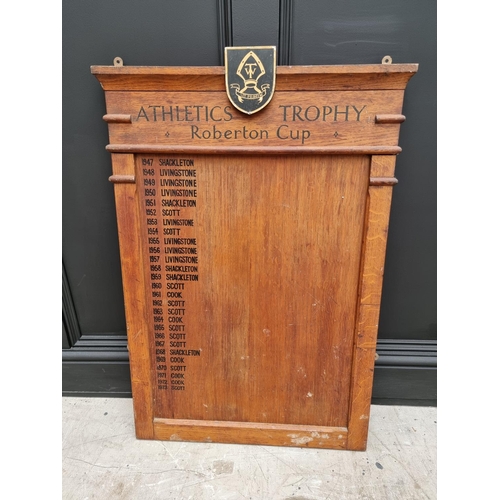 1796 - A vintage oak 'Athletics Trophy' board, 95 x 64cm. 