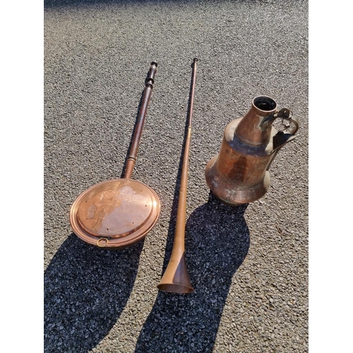 1803 - A large Persian copper jug, 46cm high; together with a hunting horn and a copper warming pan.... 