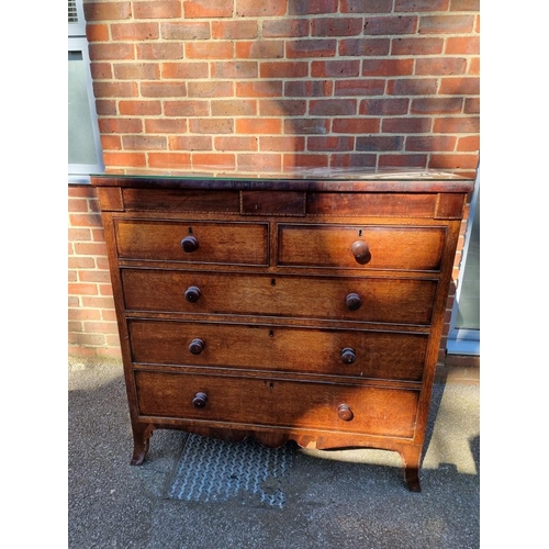 1812 - A 19th century oak and mahogany chest of drawers, 115cm wide.