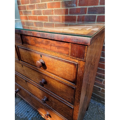 1812 - A 19th century oak and mahogany chest of drawers, 115cm wide.