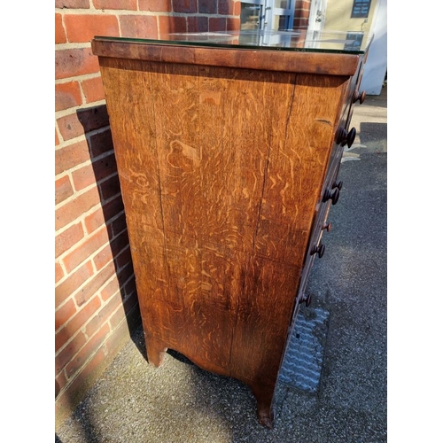 1812 - A 19th century oak and mahogany chest of drawers, 115cm wide.