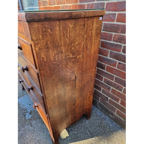 1812 - A 19th century oak and mahogany chest of drawers, 115cm wide.