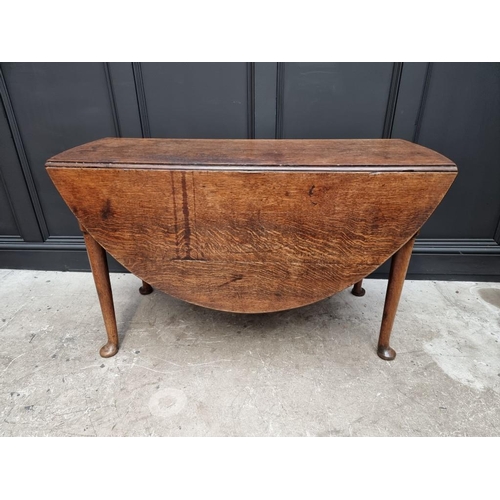 1813 - An 18th century oak gateleg table, 122cm wide.