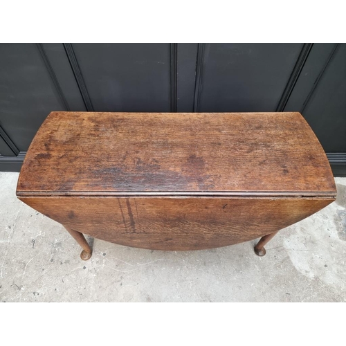 1813 - An 18th century oak gateleg table, 122cm wide.