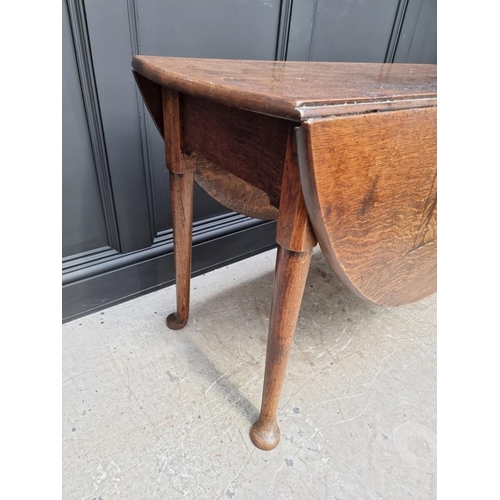 1813 - An 18th century oak gateleg table, 122cm wide.