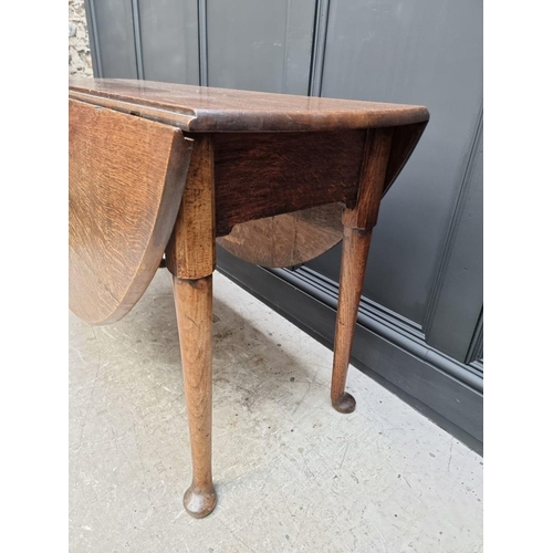 1813 - An 18th century oak gateleg table, 122cm wide.